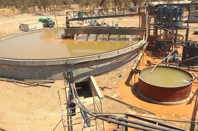 Using a concentrator to remove water from gold ore